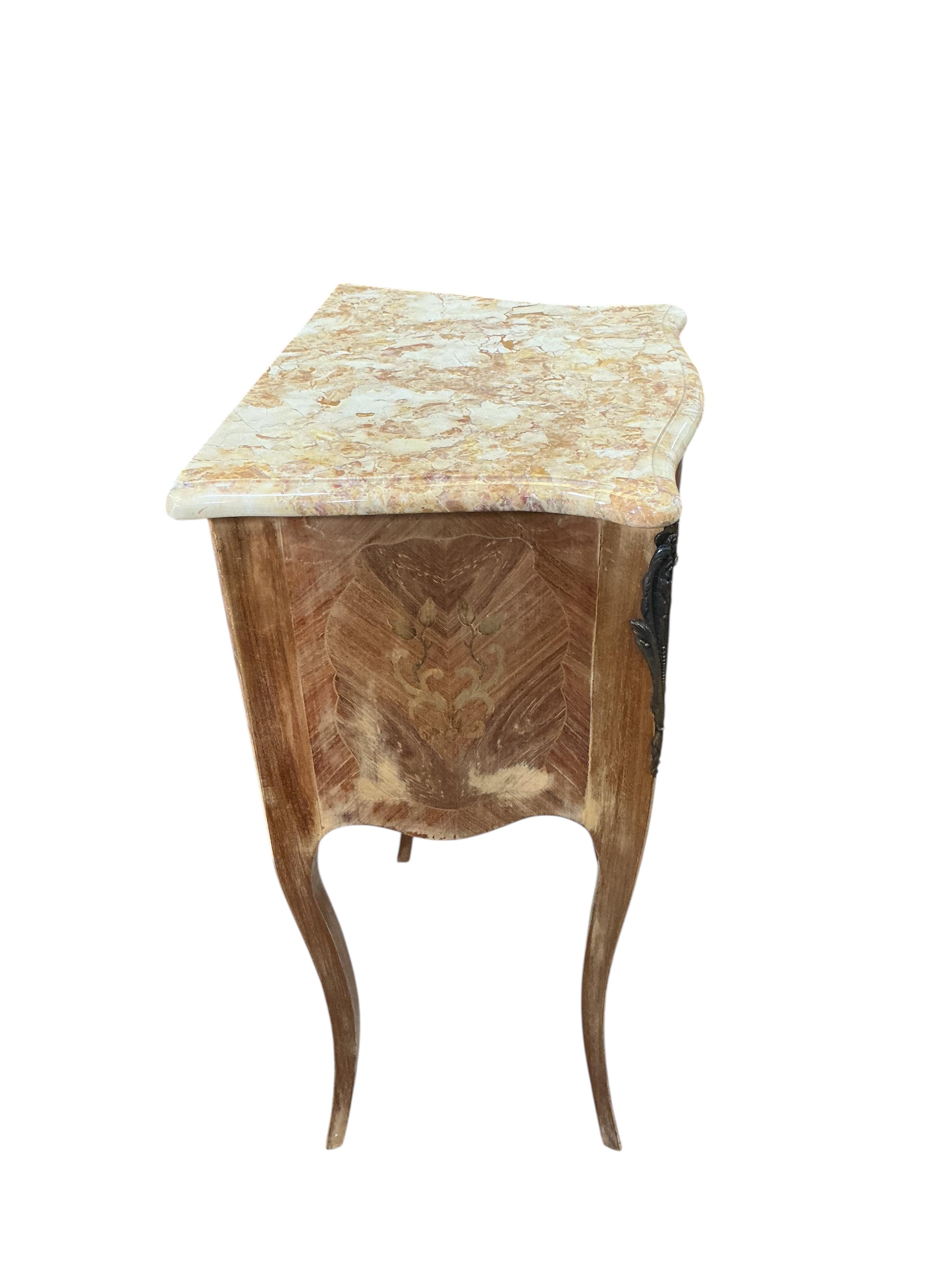 A pair of French gilt metal mounted marquetry inlaid kingwood marble top serpentine bedside chests, width 42cm, depth 32cm, height 72cm